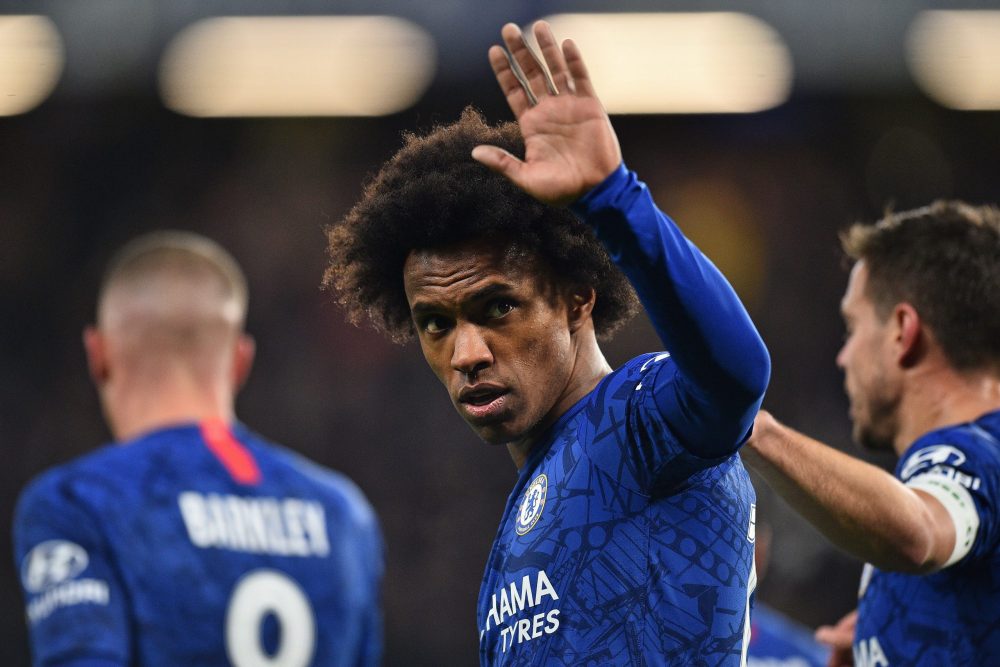 Chelsea's Brazilian midfielder Willian celebrates scoring the opening goal during the English FA Cup fifth round football match between Chelsea and Liverpool at Stamford Bridge in London on March 3, 2020. (Photo by Glyn KIRK / AFP)